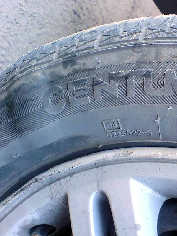 damaged tire with sidewall bubble