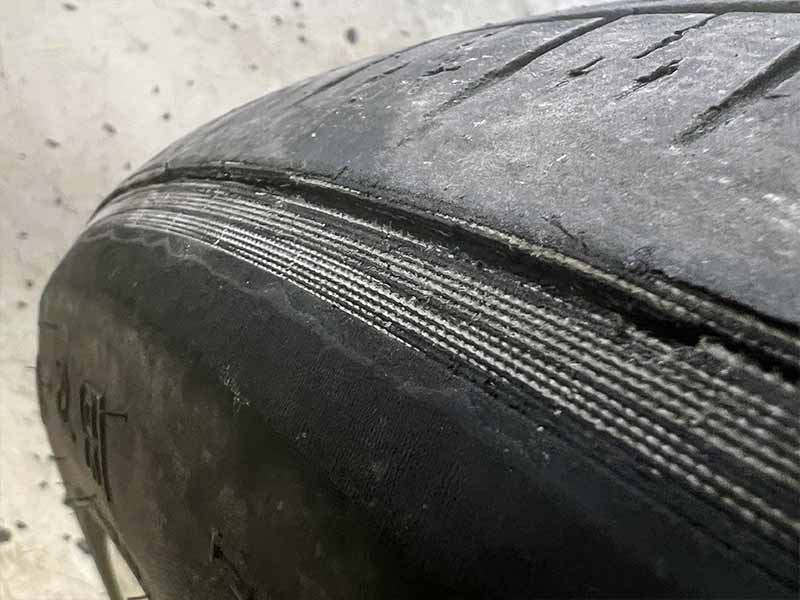 cords showing on tire tread