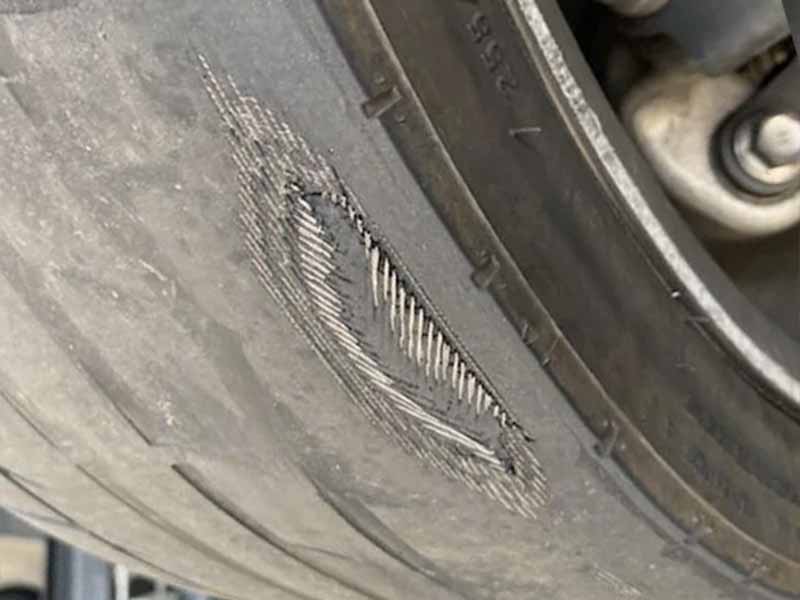 how long can you drive on tires with wire showing