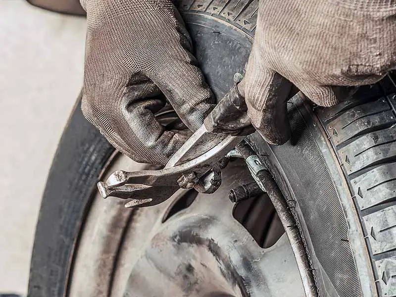 tire balancing weights inside or outside